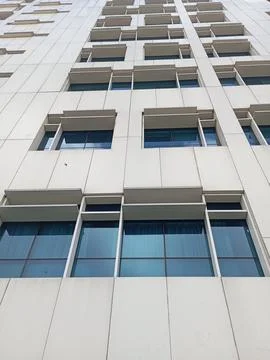 Low-angle view of modern white office building facade Foto stock