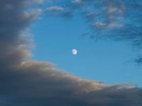 Low angle view of moon and clouds in sky, Lake of The Woods, Ontario, Canada 스톡 사진