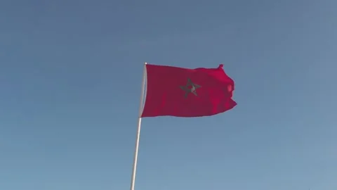 Low angle view of Moroccan flag waving with strong wind Stock Footage 252128515