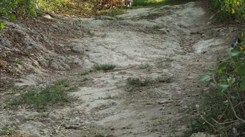Low angle view. Mountain Bike Riding on Rocks. Outdoor activity. Stock Footage 134503792