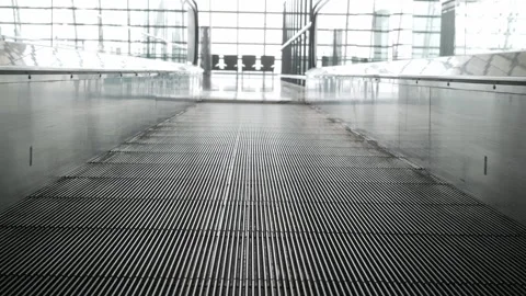 Low angle view on moving escalator in the airport while moving operating in.. Stock Footage 283629252