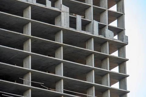 Low-angle view of a multi-level reinforced concrete building under constructi 스톡 사진