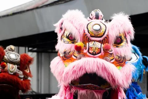 Low Angle View of Multiple Colorful Barongsai Lion Dance Heads During Chine.. Stock Photos