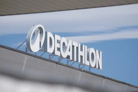 Low angle view of the new Decathlon store sign and logo in Switzerland Stock Photos