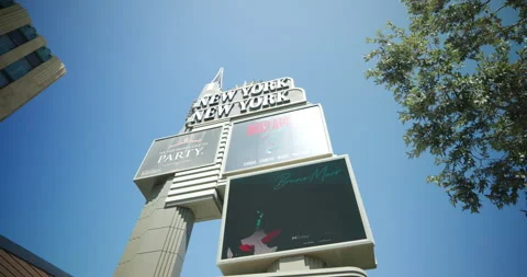 Low-angle view of the New York-New York Hotel sign, Las Vegas, Nevada, U.S. Stock Footage 250674982