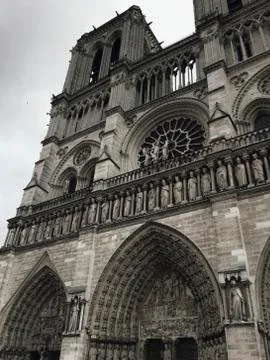 Low angle view of Notre Dame de Paris against sky Stock Photos