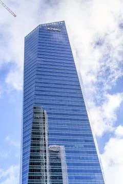 Low angle view of office building in the city of Madrid against blue sky Stock Photos