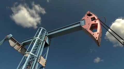 Low angle view of oil pump jack working and pumping crude oil under blue sky Stock Footage 126350726