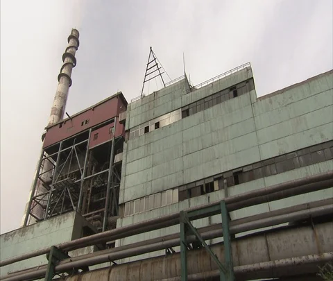 Low angle view of old coal burning power plant Stock-Footage 86744666