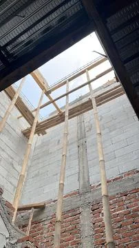 ​Low angle view of ongoing building construction site Stockfoto's