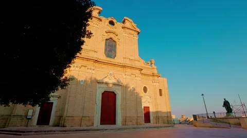 Low angle view of Oria Cathedral facade against blue sky Stock Footage 315491716