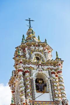 Low angle view of ornate bell tower of San Francisco Acatepec church Stock Photos