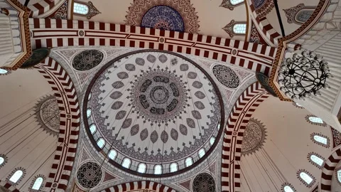Low angle view of ornate mosque dome with islamic calligraphy and beautiful.. Stock Footage 332545123