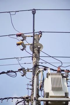Low angle view of an outdoor public utility pole electrical substation Stock Photos
