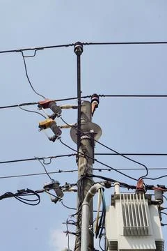 Low angle view of an outdoor public utility pole electrical substation Stock Photos