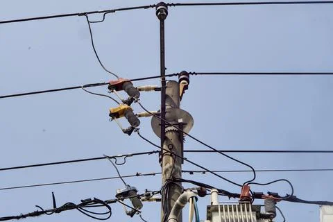 Low angle view of an outdoor public utility pole electrical substation Stock Photos