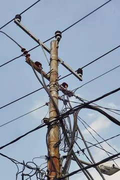 Low angle view of an outdoor public utility pole electrical substation Stock Photos