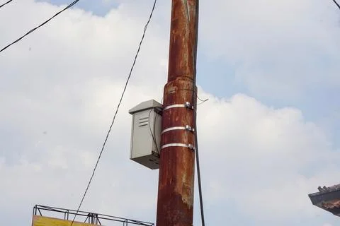 Low angle view of an outdoor public utility pole electrical substation Stock Photos