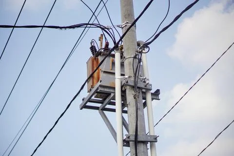 Low angle view of an outdoor public utility pole electrical substation Stock Photos