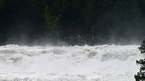 Low angle view over fast moving river rapids Stock Footage 245820013