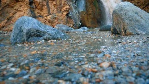 Low angle view of pacific mountain river. Slow motion. Close up of crystal water Stock Footage 105422741
