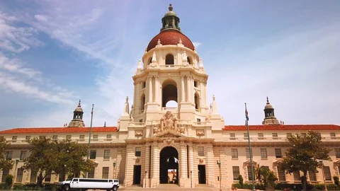 Low angle view of Pasadena City Hall with a white Hummer Limo driving off Stock Footage 108410025