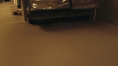 Low angle view of passengers in a train carriage Stock-Footage 117346994