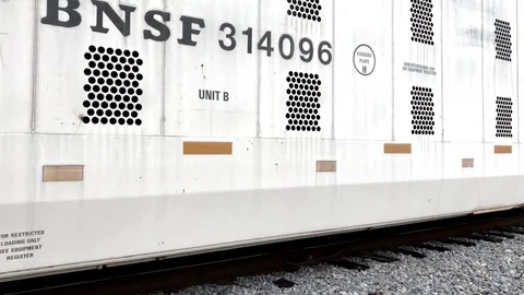 Low Angle View of Passing Freight Train Stock Footage 81415686