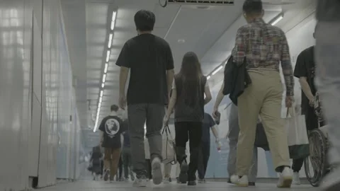 Low Angle View of Pedestrians in Beijing Subway Corridor Видео 341457036