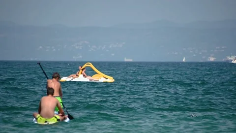 Low angle view of people enjoy summer vacation Stock Footage 172243778