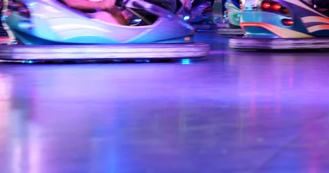 Low angle view of people ride bumper cars. Stock Footage 113703742
