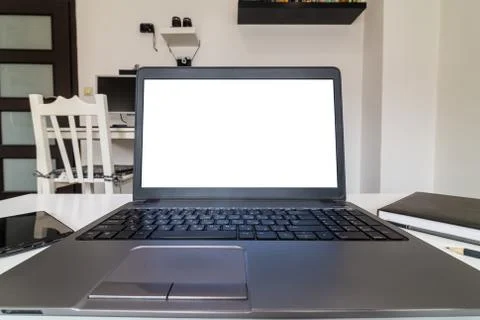 Low angle view of a person working on a laptop from home Stock Photos