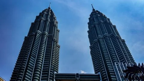The low angle view of the Petronas Twin Towers or KLCC in the city. Stock Photos