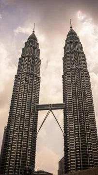 The low angle view of the Petronas Twin Towers or KLCC in the city. Stock Photos