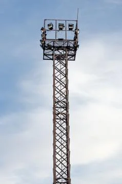 Low angle view of  pillar with reflectors for night lighting of train tracks Stock Photos