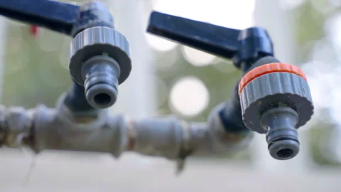 Low angle view of plastic water taps for household usage Stock Footage 288453240