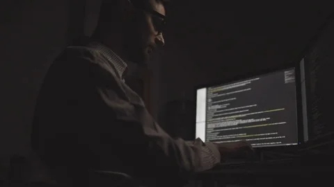 Low angle view of professional hacker working Video stock 75017298