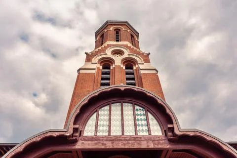 Low angle view of red brick bell tower at Curtea de Arges Monastery in Arges  Foto stock