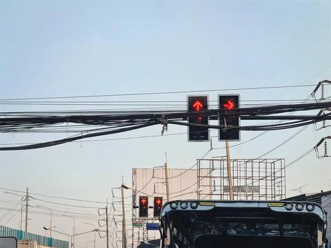 Low Angle View of Red Traffic Light at Intersection in Thailand Stock Photos