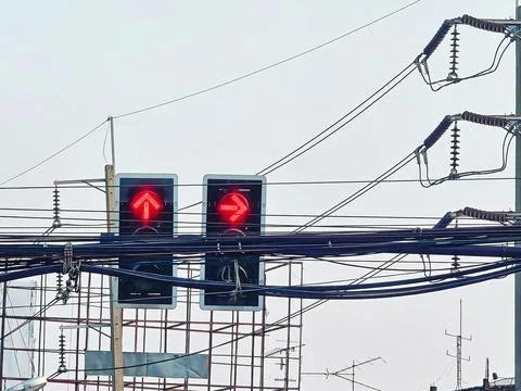 Low Angle View of Red Traffic Light with Messy Electrical Wires and Cables Stock Photos