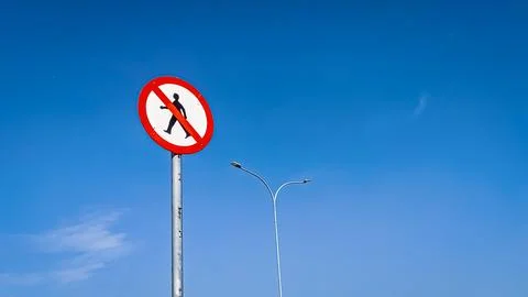 Low Angle View of A Road Sign Prohibition No Pedestrians. Stock Photos