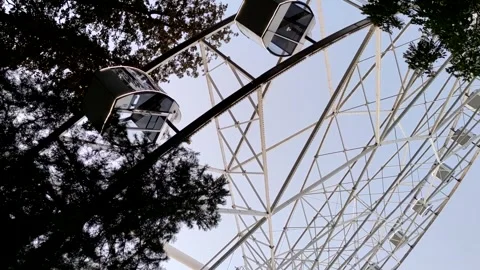 Low angle view of rotating ferris wheel Stock Footage 287096660