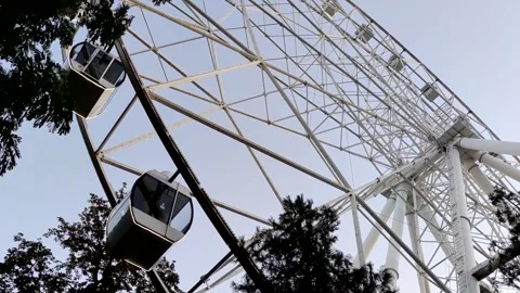 Low angle view of rotating ferris wheel Stock Footage 287096662