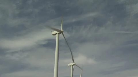 Low Angle View of Rows of Wind Turbines Against A Cloudy Sky 스톡 동영상 19170086