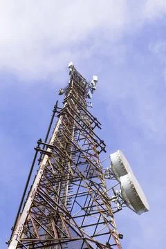 Low Angle View of Rusty Telecommunication Tower Foto stock