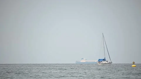 Low angle view of sailboat sailing in open sea Stock Footage 160589850