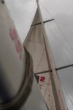 Low Angle View of Sailing Boat Mast and Weathered Sail in Norway Stock Photos