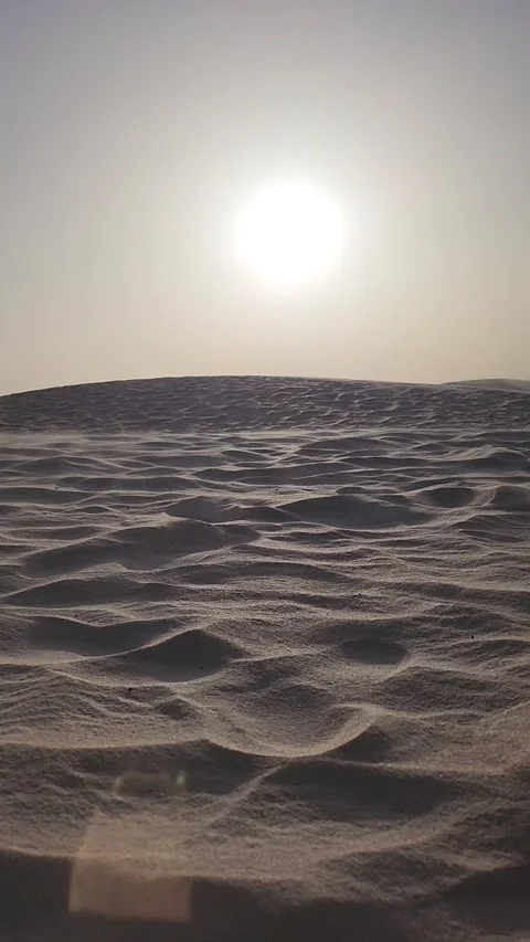Low Angle View of Sand Blowing Across Sahara Dunes Stock Footage 340359454