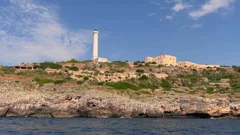 Low angle view of Santa Maria di Leuca lighthouse from tour boat Видео 279433085
