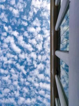 Low angle view of scattered clouds Stock Photos
